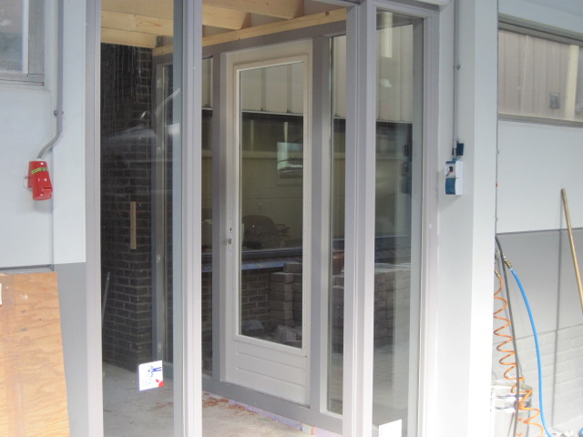 Doorgang van de showroom naar de werkplaats