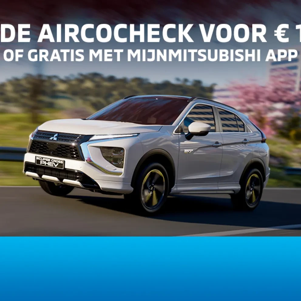Witte Eclipse Cross PHEV tegen een zomerse stadsachtergrond